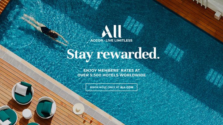 White text outlining a rewards program set against a blue hotel pool